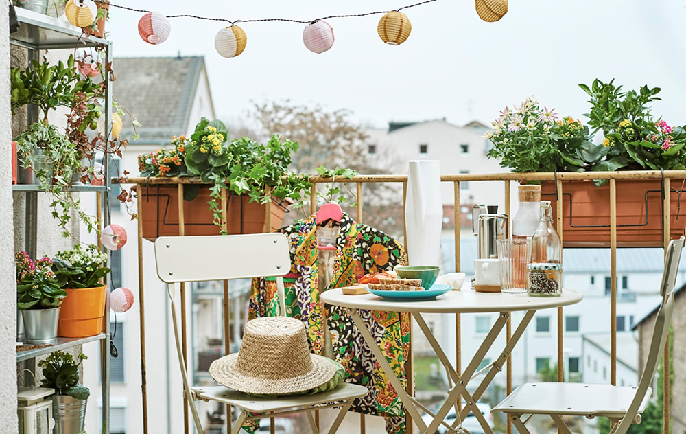 a city balcony with flower boxes a shelf unit with plants st baa3b3c6e8cabb7106760af49fc23beb